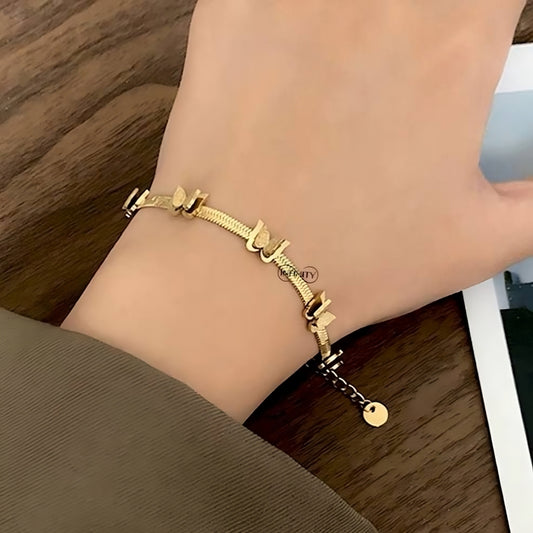 Snake Back Bracelet – 18K Gold-Plated | Decorated with Delicate Butterflies