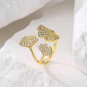 خاتم مطلي بالذهب على شكل وردة – مزين بفصوص زركون لامعة | ستانلس ستيل 316