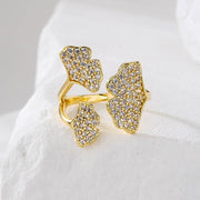 خاتم مطلي بالذهب على شكل وردة – مزين بفصوص زركون لامعة | ستانلس ستيل 316